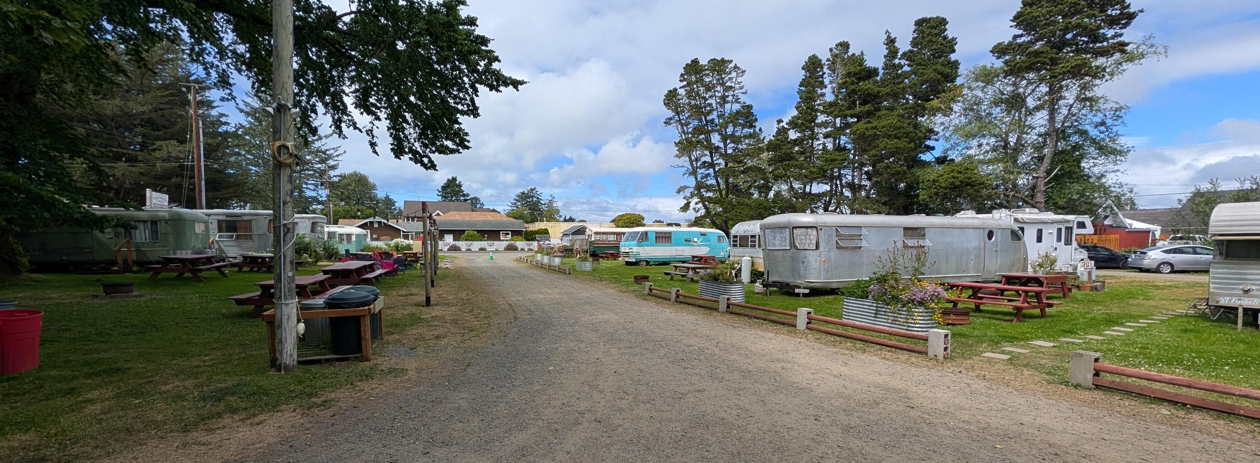 Rows of vintage travel trailers. Each is a reservable room. There's a vinyl and VHS library with turntables and TVs with built-in VHS decks to borrow.